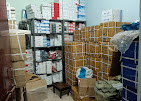 Store room stacked with cartons of CCTV stock